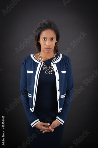 Beautiful woman doing different expressions in different sets of clothes: angry
