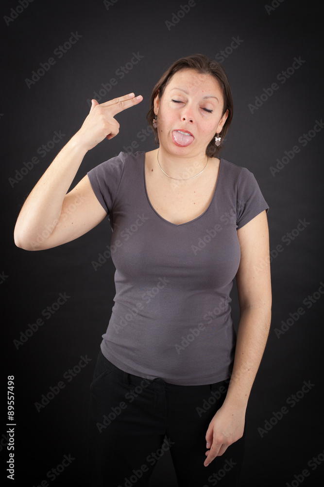 Beautiful woman doing different expressions in different sets of clothes: suicide Beautiful woman doing different expressions in different sets of clothes: suicide