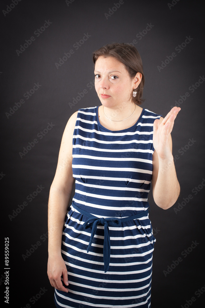 Beautiful woman doing different expressions in different sets of clothes: be careful Beautiful woman doing different expressions in different sets of clothes: be careful