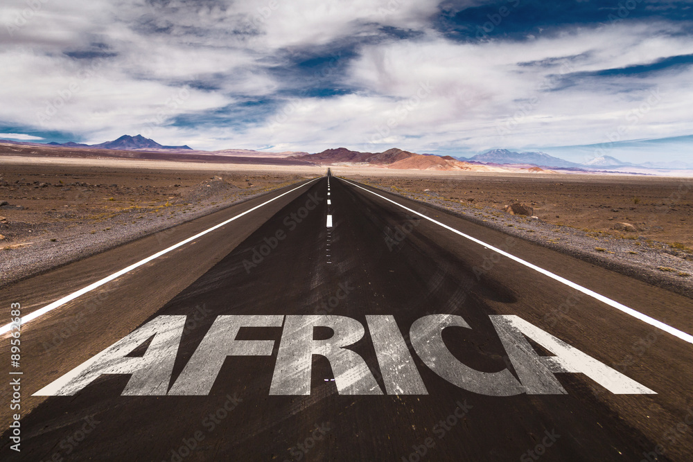 Fototapeta premium Africa written on desert road