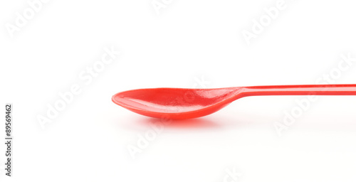 plastic spoon on white background