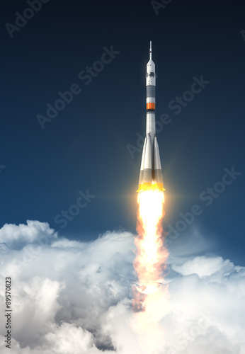 Carrier Rocket Over The Clouds