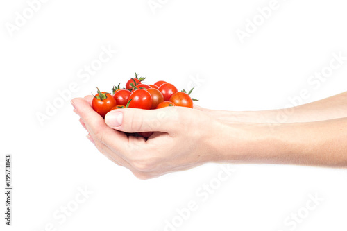 tomato in woman hands