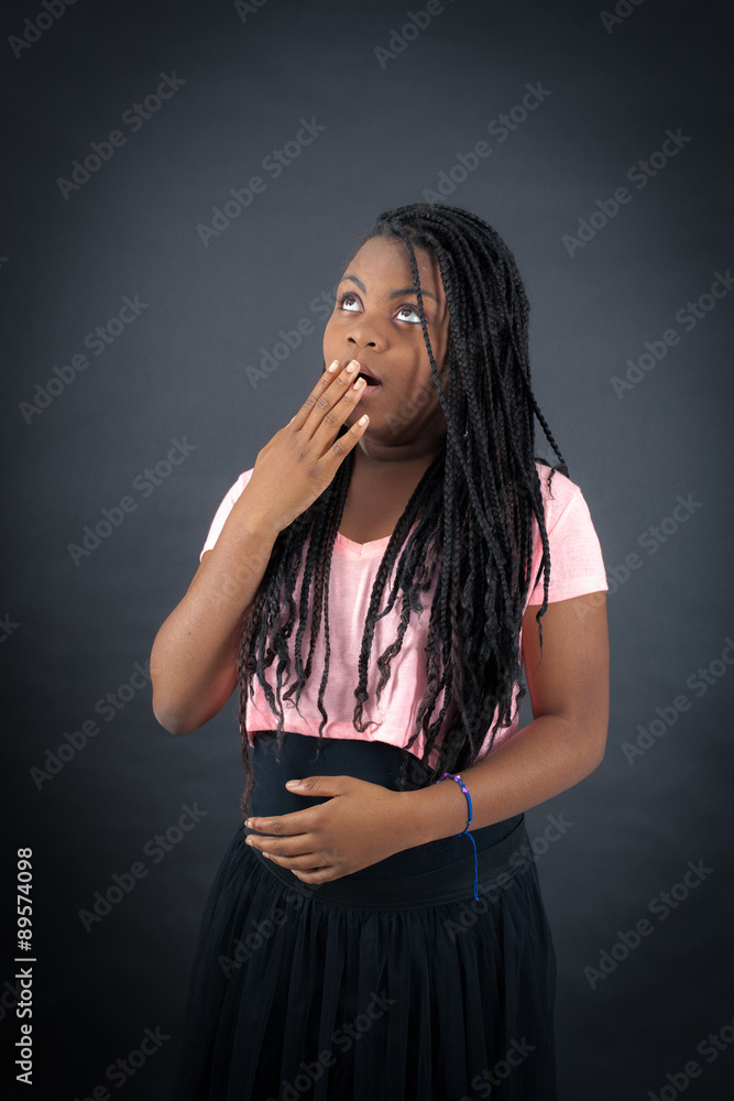 Beautiful girl doing different expressions in different sets of clothes: yawn