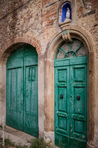 Green door at Toiano, ghost town in Italy © Emanuele Mazzoni