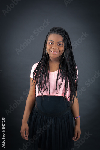 Beautiful girl doing different expressions in different sets of clothes: smile