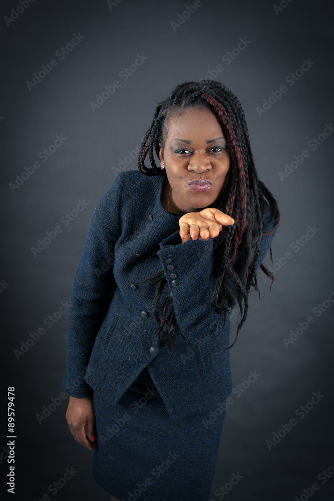 Beautiful woman doing different expressions in different sets of clothes: kiss Beautiful woman doing different expressions in different sets of clothes: kiss