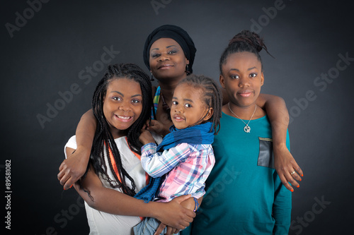 Wallpaper Mural Beautiful family doing different expressions in different sets of clothes: pointing Torontodigital.ca