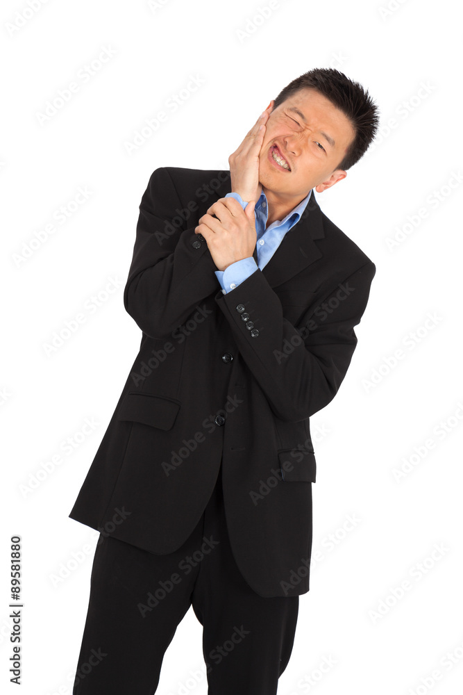 handsome man doing different expressions in different sets of clothes: toothache handsome man doing different expressions in different sets of clothes: toothache