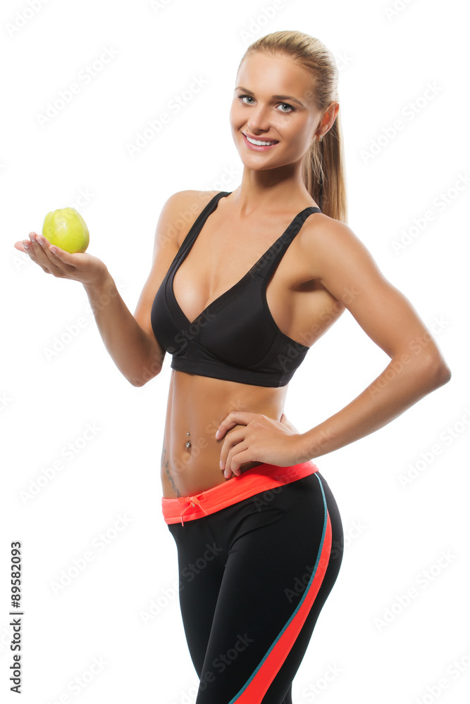 Healthy beautiful blonde woman holding an apple, smiling. Healthy beautiful blonde woman holding an apple, smiling.