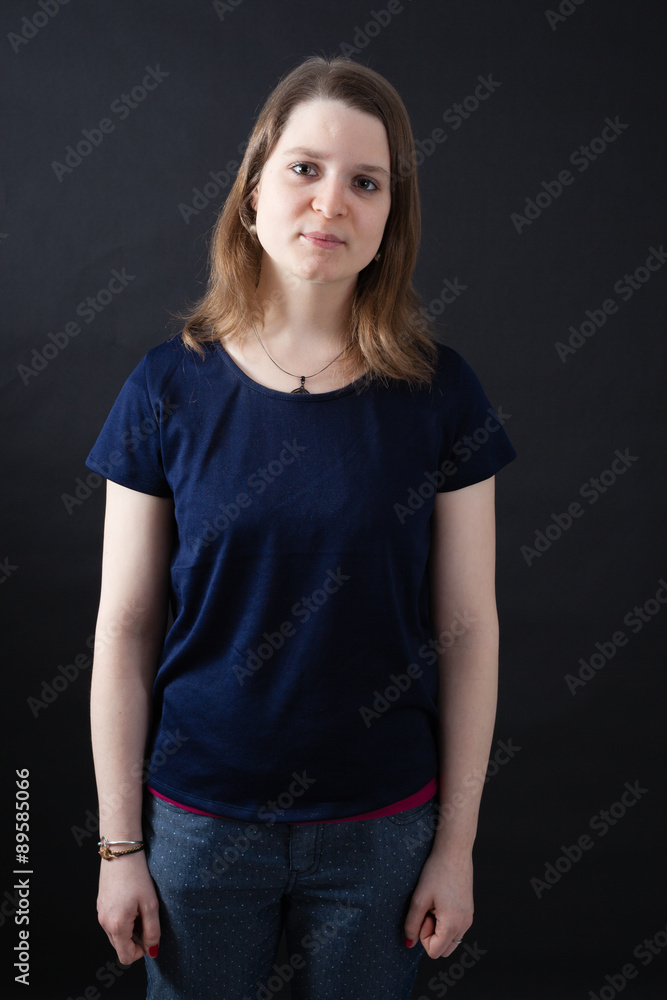 Obraz premium Beautiful woman doing different expressions in different sets of clothes: love