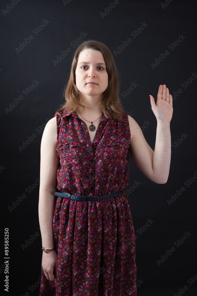 Beautiful woman doing different expressions in different sets of clothes: waving Beautiful woman doing different expressions in different sets of clothes: waving