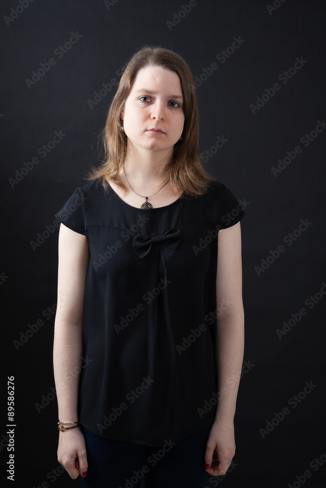 Beautiful woman doing different expressions in different sets of clothes: angry Beautiful woman doing different expressions in different sets of clothes: angry