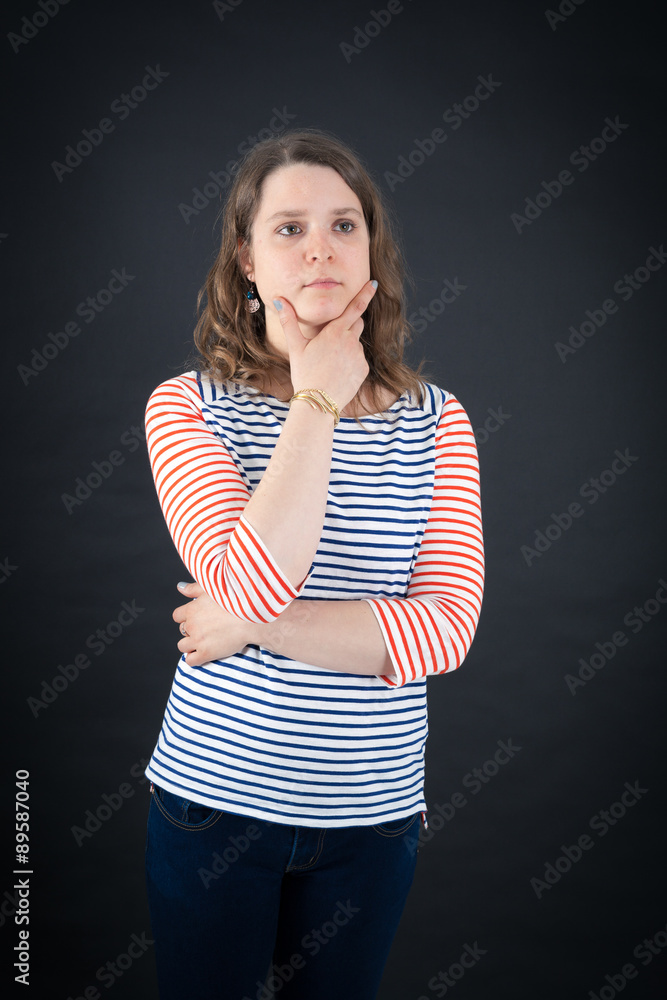 Beautiful woman doing different expressions in different sets of clothes: thinking Beautiful woman doing different expressions in different sets of clothes: thinking
