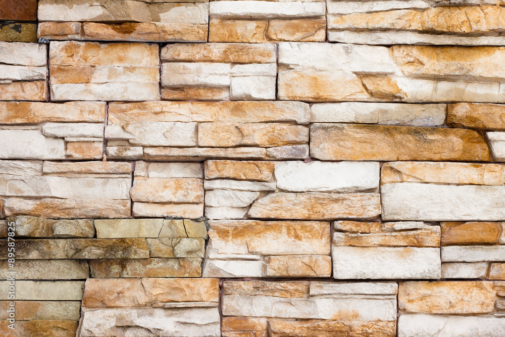 External brown stone wall background External brown stone wall background