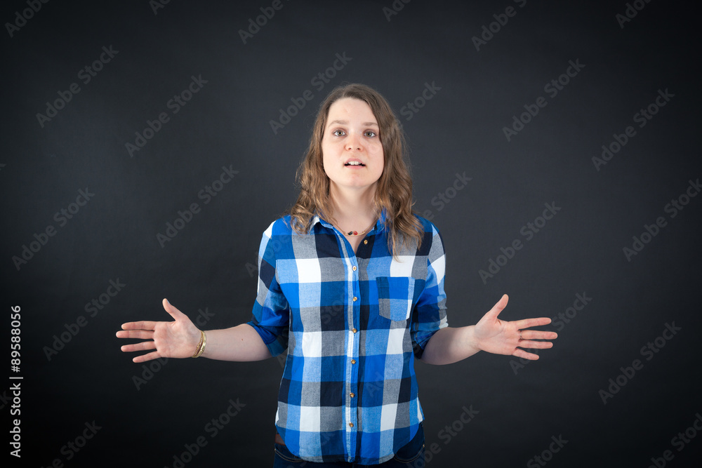 Beautiful woman doing different expressions in different sets of clothes: surprise Beautiful woman doing different expressions in different sets of clothes: surprise