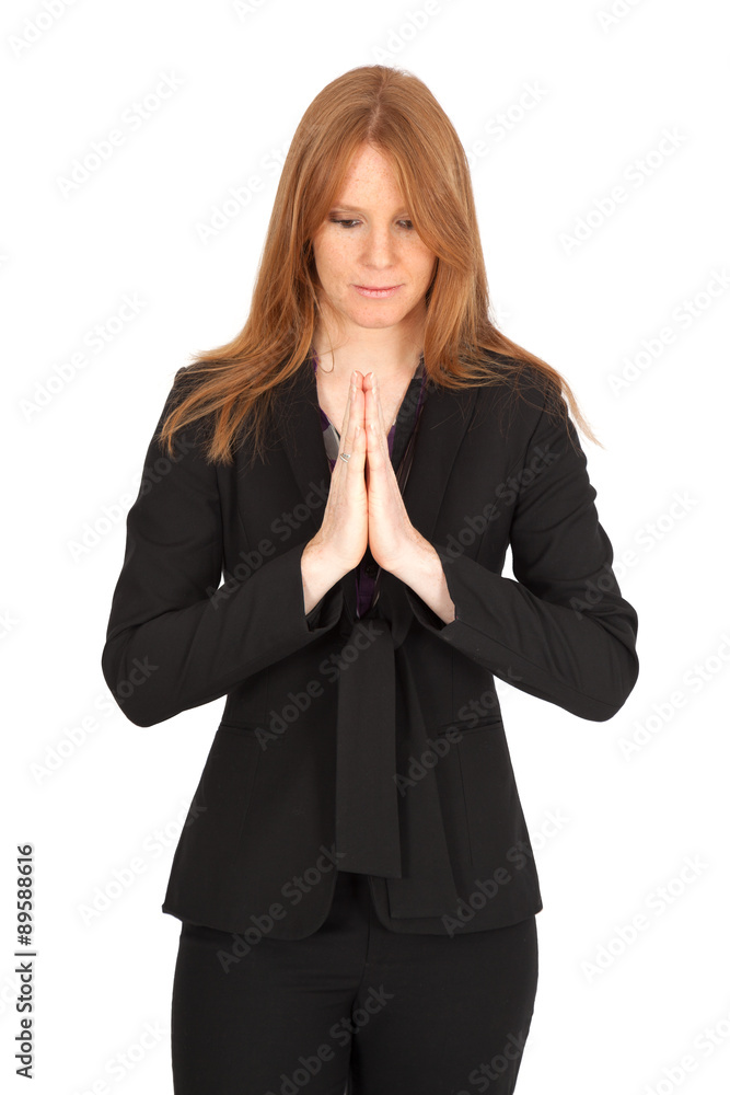 Beautiful businesswoman doing different expressions in different sets of clothes: praying Beautiful businesswoman doing different expressions in different sets of clothes: praying