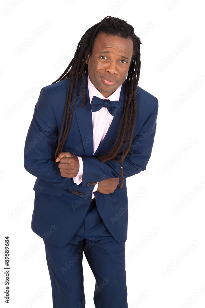 Handsome man with dreadlocks doing different expressions in different sets of clothes: stomachache Handsome man with dreadlocks doing different expressions in different sets of clothes: stomachache