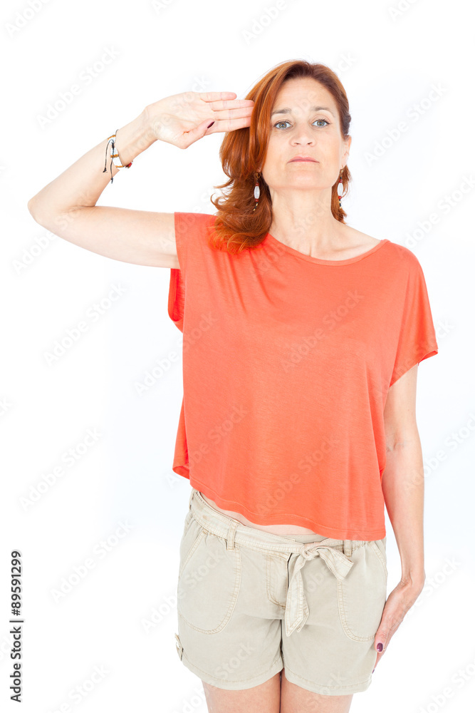 Beautiful businesswoman doing different expressions in different sets of clothes: at attention Beautiful businesswoman doing different expressions in different sets of clothes: at attention
