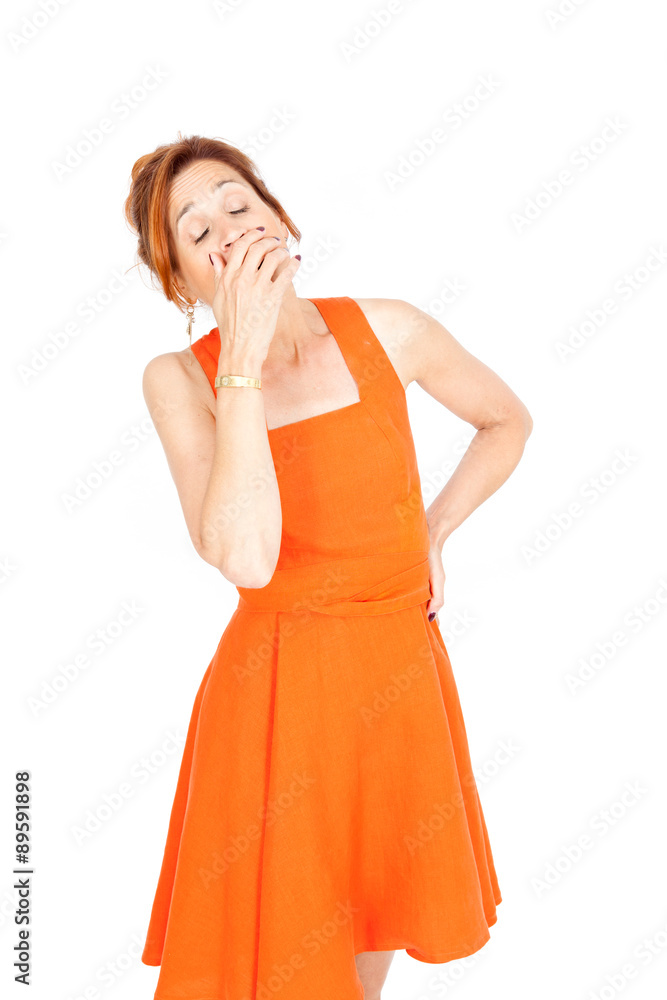 Beautiful businesswoman doing different expressions in different sets of clothes: yawning Beautiful businesswoman doing different expressions in different sets of clothes: yawning