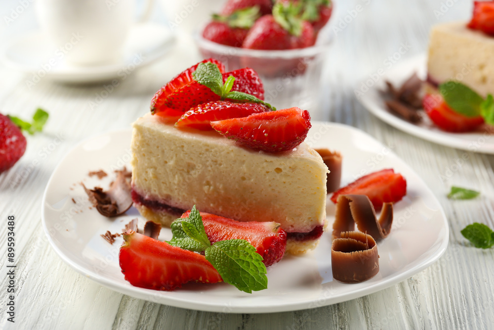 Delicious cheesecake with berries on table close up Delicious cheesecake with berries on table close up