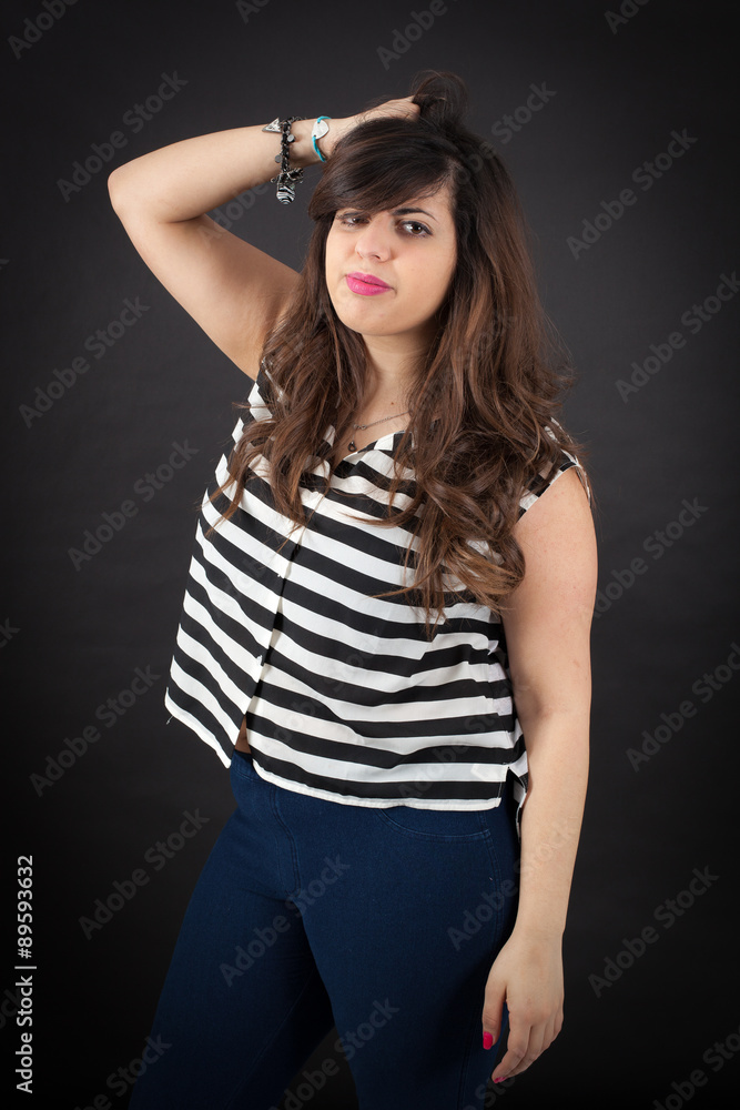 Beautiful woman doing different expressions in different sets of clothes: worried Beautiful woman doing different expressions in different sets of clothes: worried