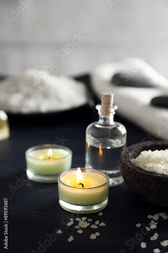 Composition of spa treatment on table colorful background