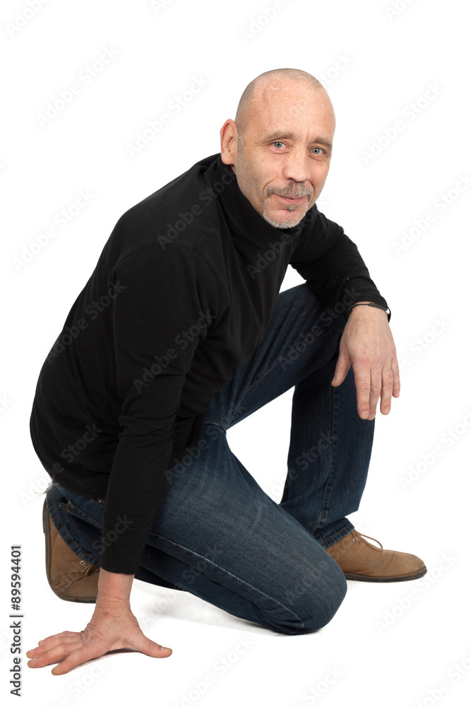 Handsome man doing different expressions in different sets of clothes: kneeling Handsome man doing different expressions in different sets of clothes: kneeling