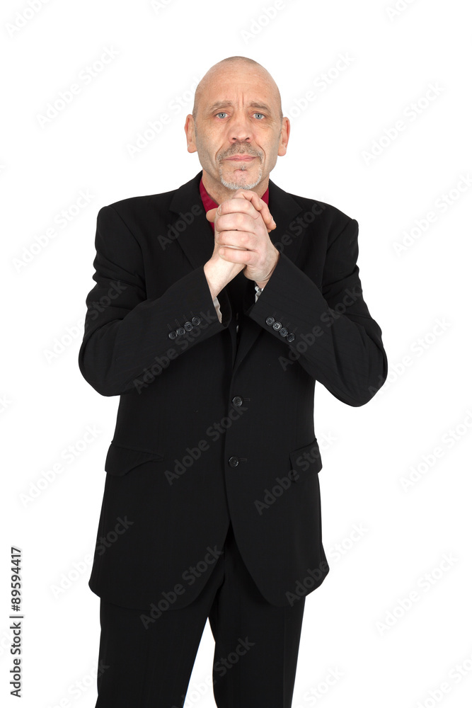 Handsome man doing different expressions in different sets of clothes: prayer Handsome man doing different expressions in different sets of clothes: prayer