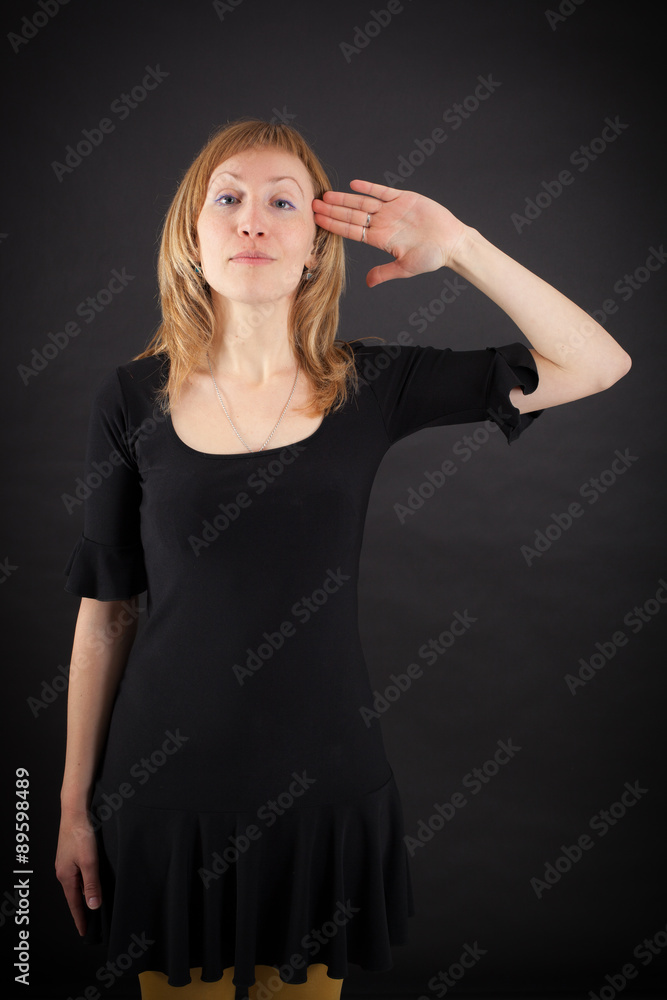 beautiful woman doing different expressions in different sets of clothes: at attention beautiful woman doing different expressions in different sets of clothes: at attention
