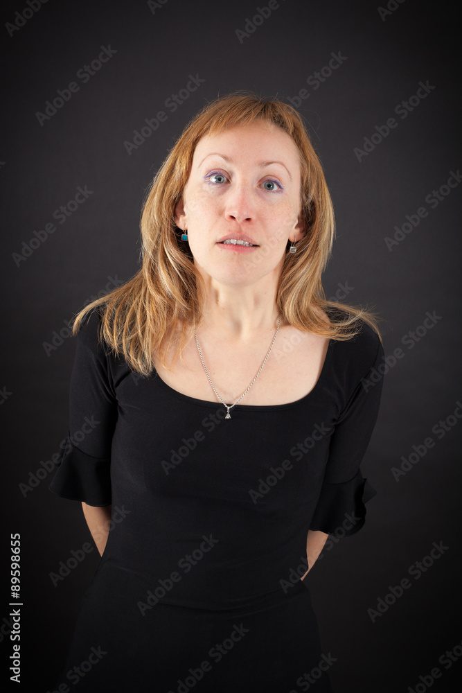 beautiful woman doing different expressions in different sets of clothes: tired