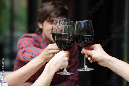 friends toasting with wine