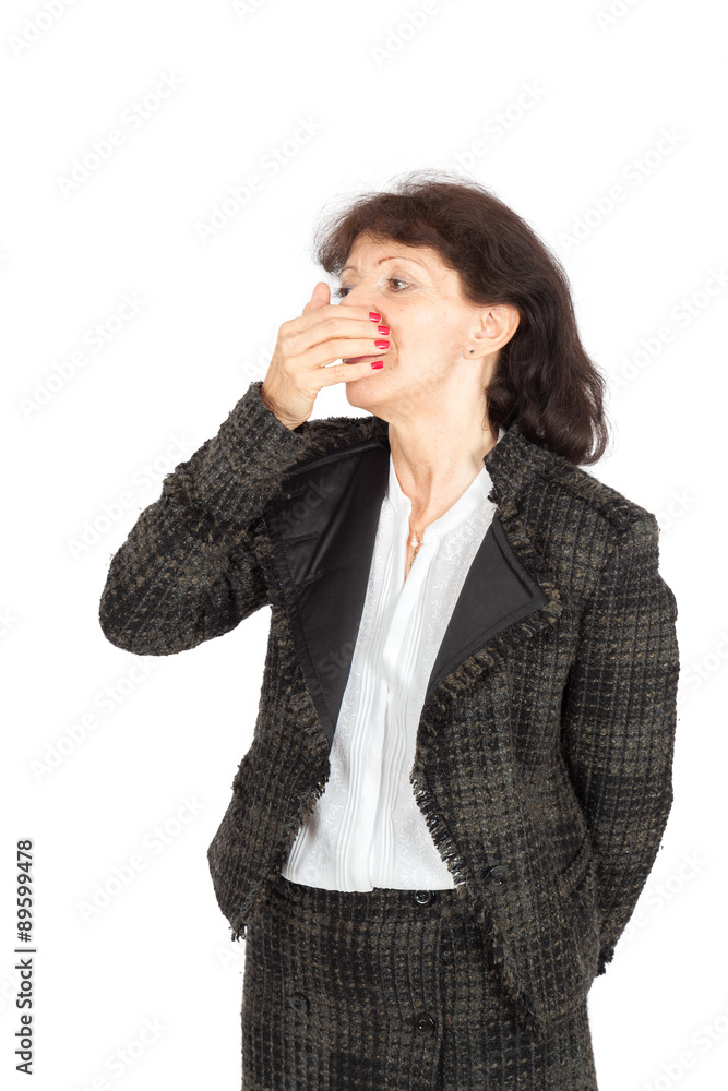 Beautiful businesswoman doing different expressions in different sets of clothes: yawning Beautiful businesswoman doing different expressions in different sets of clothes: yawning