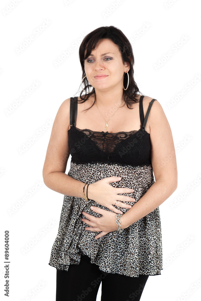 Beautiful woman doing different expressions in different sets of clothes: stomachache Beautiful woman doing different expressions in different sets of clothes: stomachache