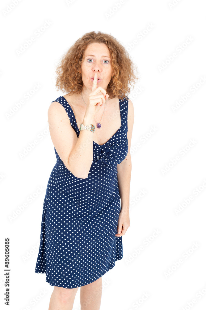 Beautiful woman doing different expressions in different sets of clothes: be quiet Beautiful woman doing different expressions in different sets of clothes: be quiet