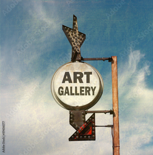 aged and worn vintage photo of art gallery sign