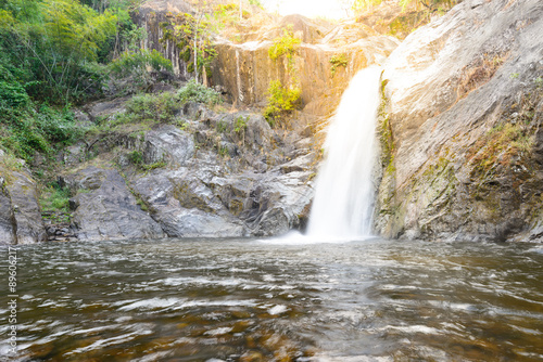 Waterfall in deep rain forest.