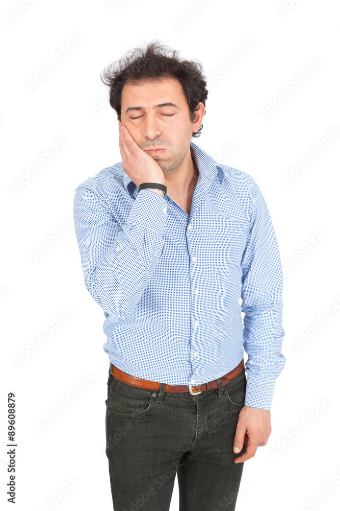 Handsome arabic man doing different expressions in different sets of clothes: toothache Handsome arabic man doing different expressions in different sets of clothes: toothache