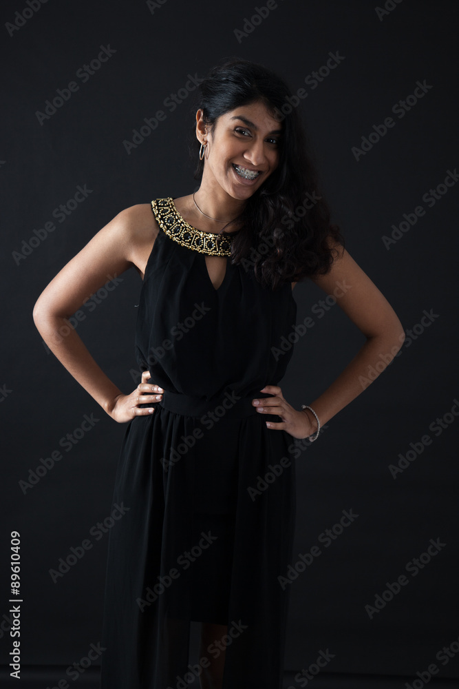 Beautiful woman doing different expressions in different sets of clothes: smile Beautiful woman doing different expressions in different sets of clothes: smile