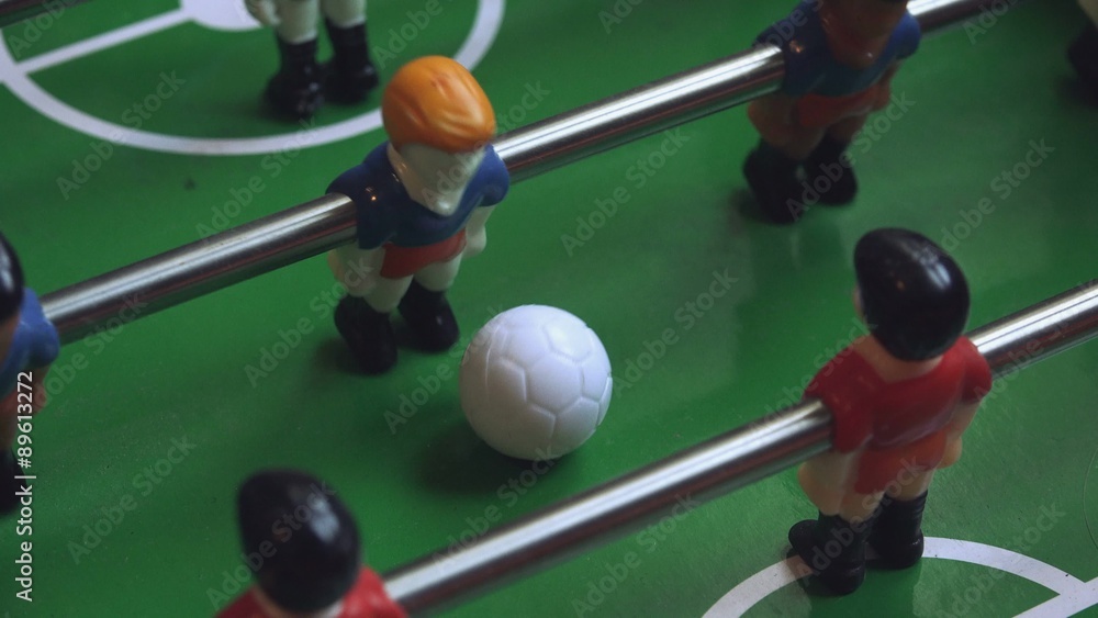 Table soccer player kicking the football at goal, vintage foosball entertainment sport game, 3840x2160, 2160p 4k UHD footage Table soccer player kicking the football at goal, vintage foosball entertainment sport game, 3840x2160, 2160p 4k UHD footage