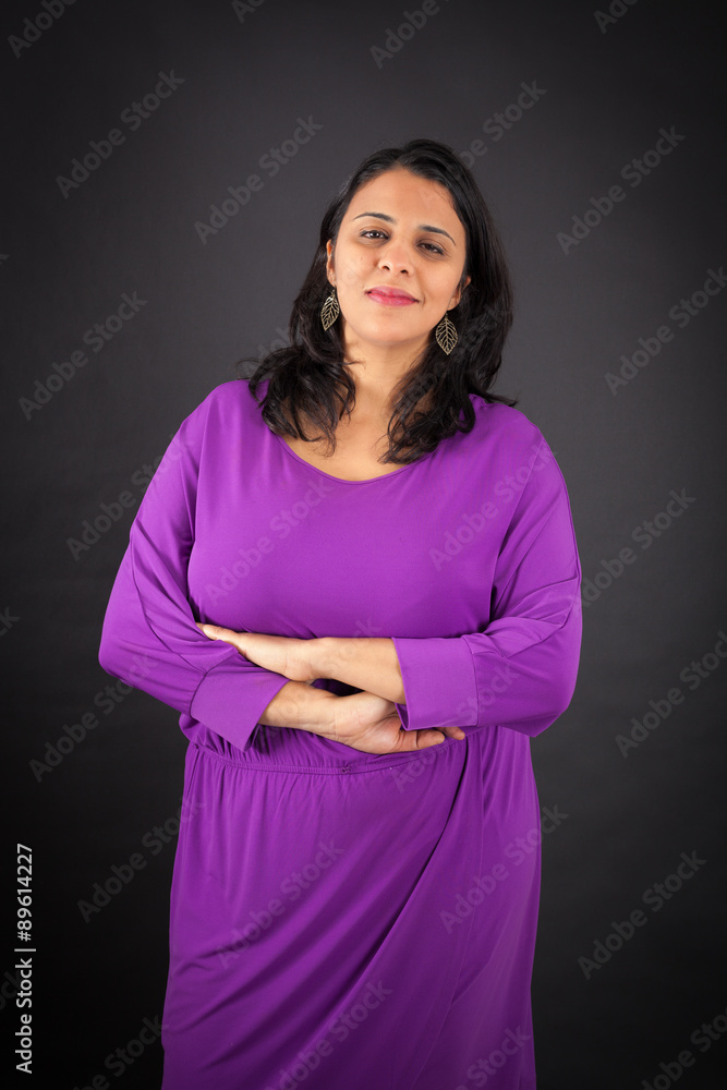 Obraz premium Beautiful woman doing different expressions in different sets of clothes: arms crossed