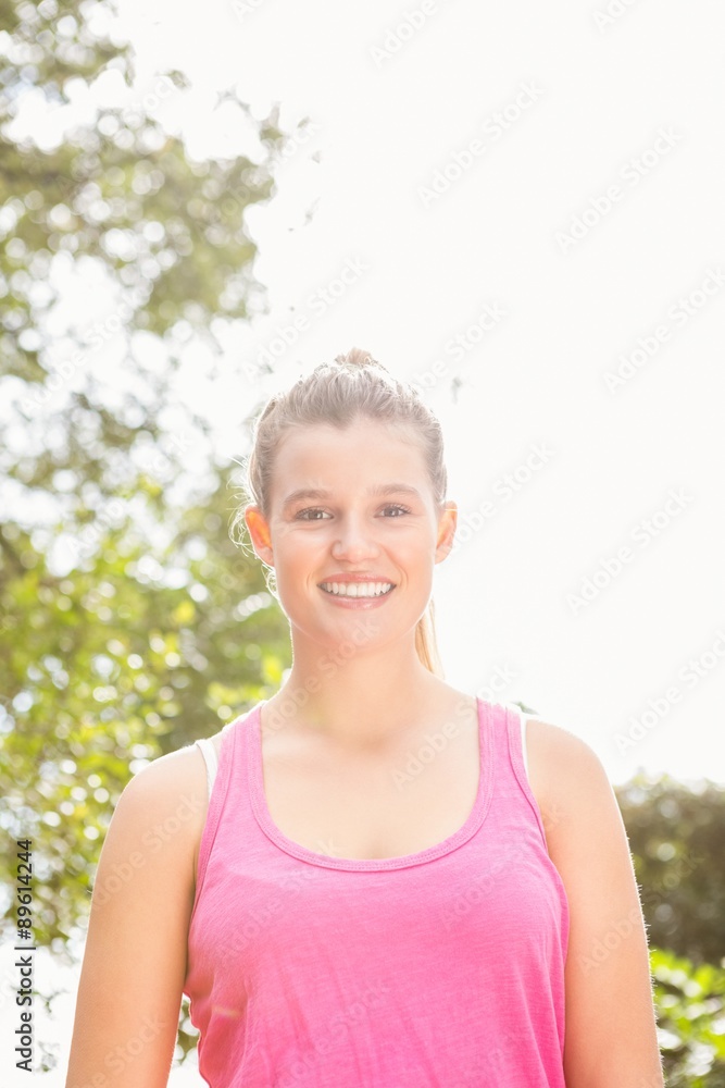 Smiling blonde athlete looking at camera Smiling blonde athlete looking at camera