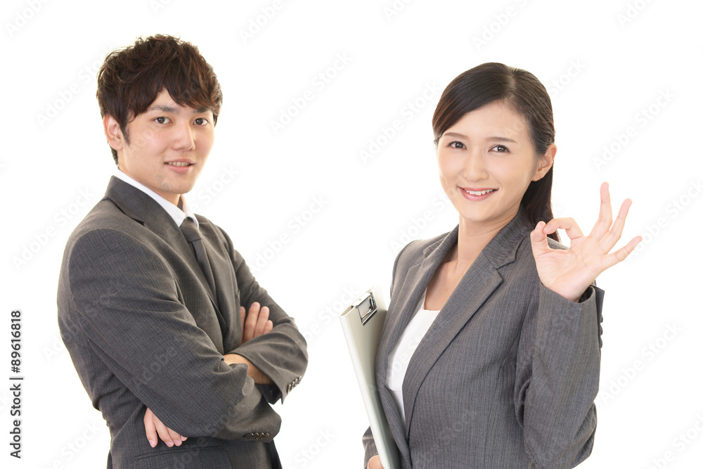 笑顔のビジネスマンとOL