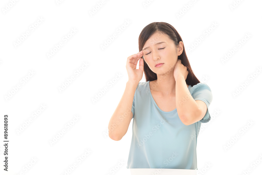 頭痛をうったえる女性 頭痛をうったえる女性