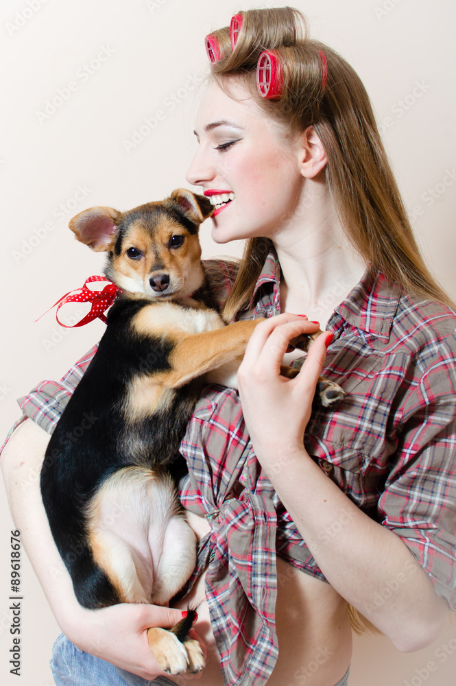 Young woman and her puppy