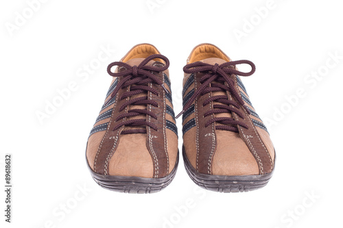 Man's leather brown shoes isolated on white background