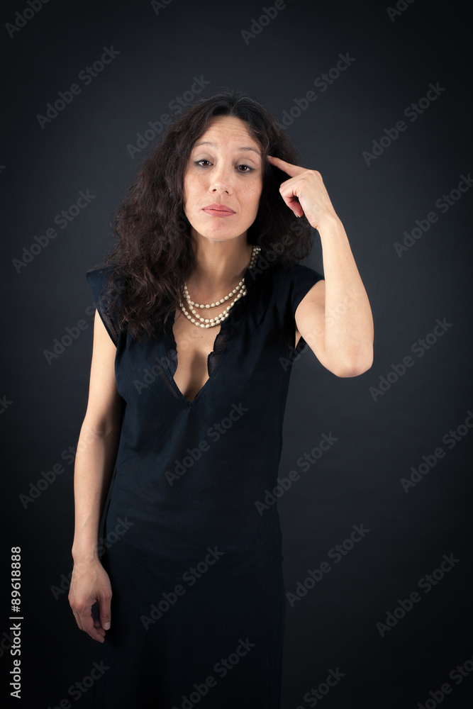 Beautiful woman doing different expressions in different sets of clothes: you are crazy Beautiful woman doing different expressions in different sets of clothes: you are crazy
