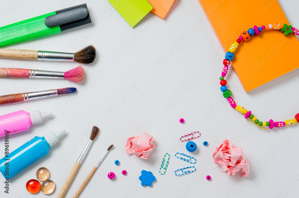 Photo of workplace with lots of stationery objects. Photo of workplace with lots of stationery objects.