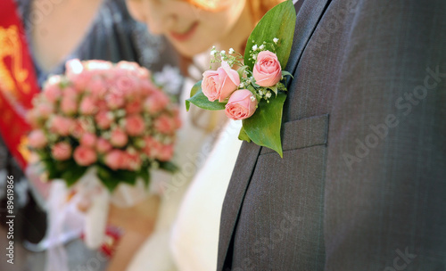 Wedding groom buttonhole-flower with roses 
 photo