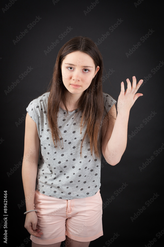 Fototapeta premium beautiful woman doing different expressions in different sets of clothes: you are crazy